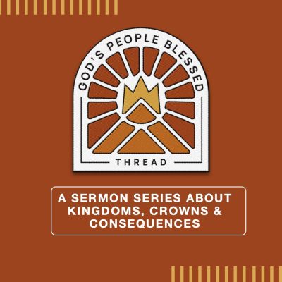 a patch with a crown and rays of light